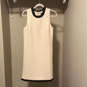 Cream shift dress with ruffles